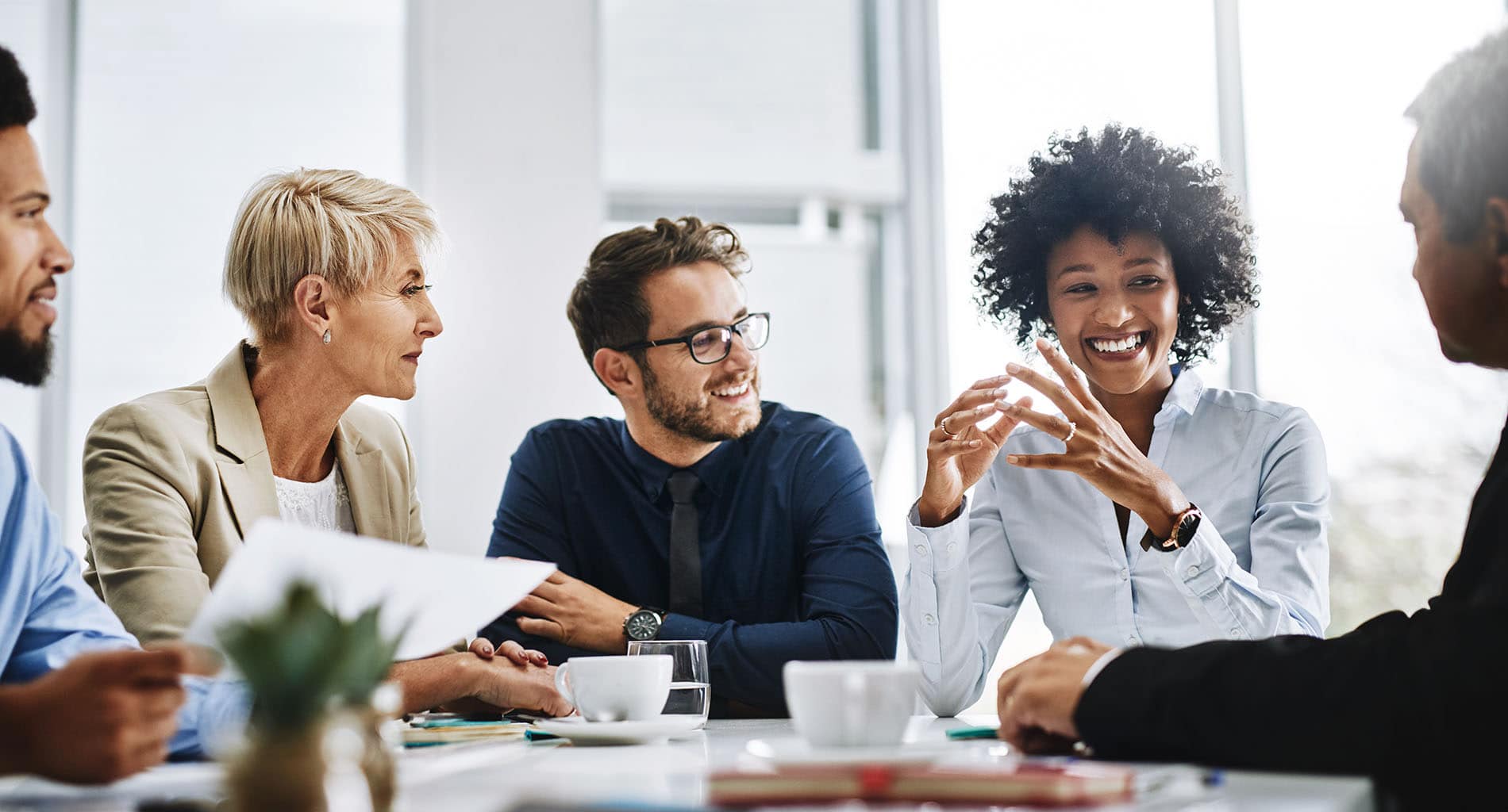 Shot of a group of businesspeople sitting together in a meeting